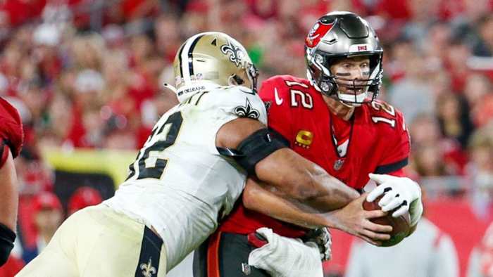 Saints DE Marcus Davenport (92) sacks Buccaneers QB Tom Brady (12). Credit: Tampa Bay Times